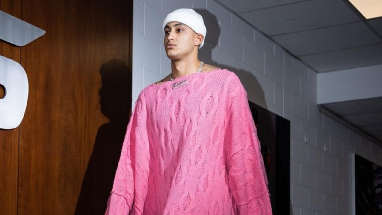 Kyle Kuzma's pregame outfit tonight included a jacket with mirrors.  Thoughts? 🤔