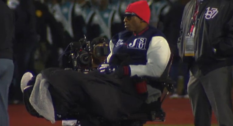 Why is Coach Prime in a Wheelchair 